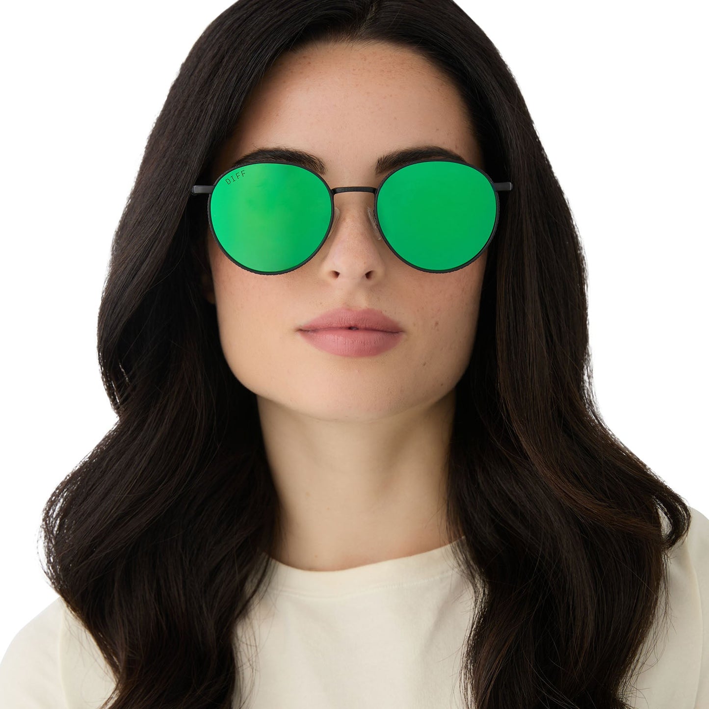 on model - female wearing harry potter x diff eyewear featuring the snape round sunglasses with a matte black metal frame and green mirror lenses front view