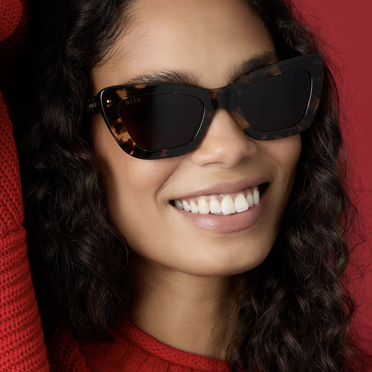 on model - female wearing diff eyewear featuring the adriana cateye sunglasses with a espresso tortoise frame and brown polarized lenses front view