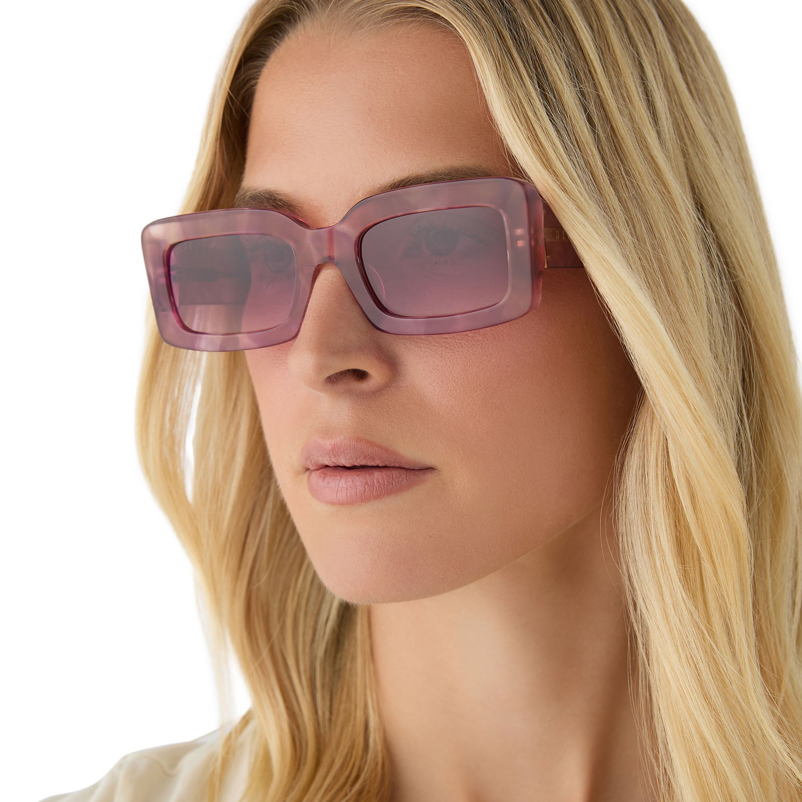 on model - female wearing diff eyewear featuring the indy rectangle sunglasses with a fleur pink tortoise frame and wine gradient lenses front view