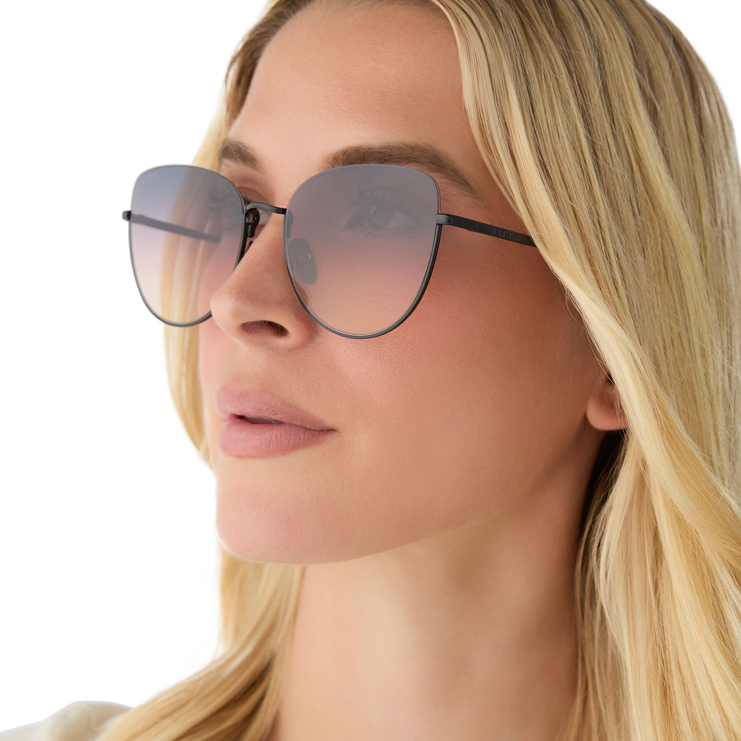 on model - female wearing diff eyewear featuring the kinsley round sunglasses with a black frame and twilight gradient lenses angled view