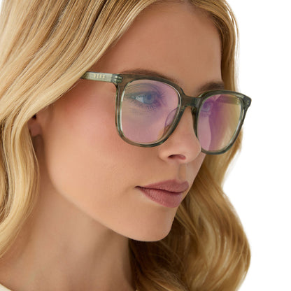 on model - female wearing diff eyewear featuring the parker square prescription glasses with a cool matcha green frame and prescription lenses detailed view