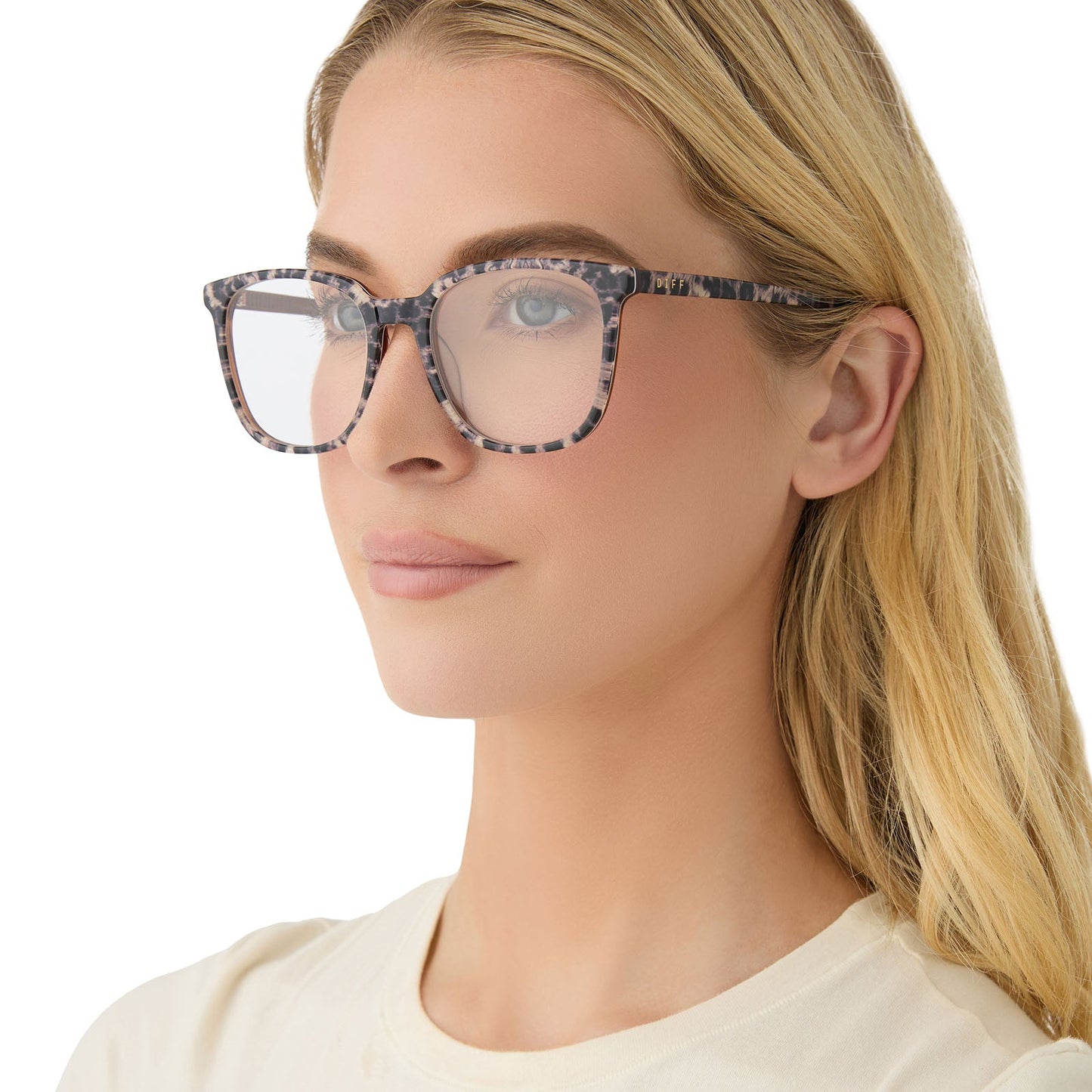 on model - female wearing diff eyewear featuring the parker square prescription glasses with a leopard tortoise frame side view