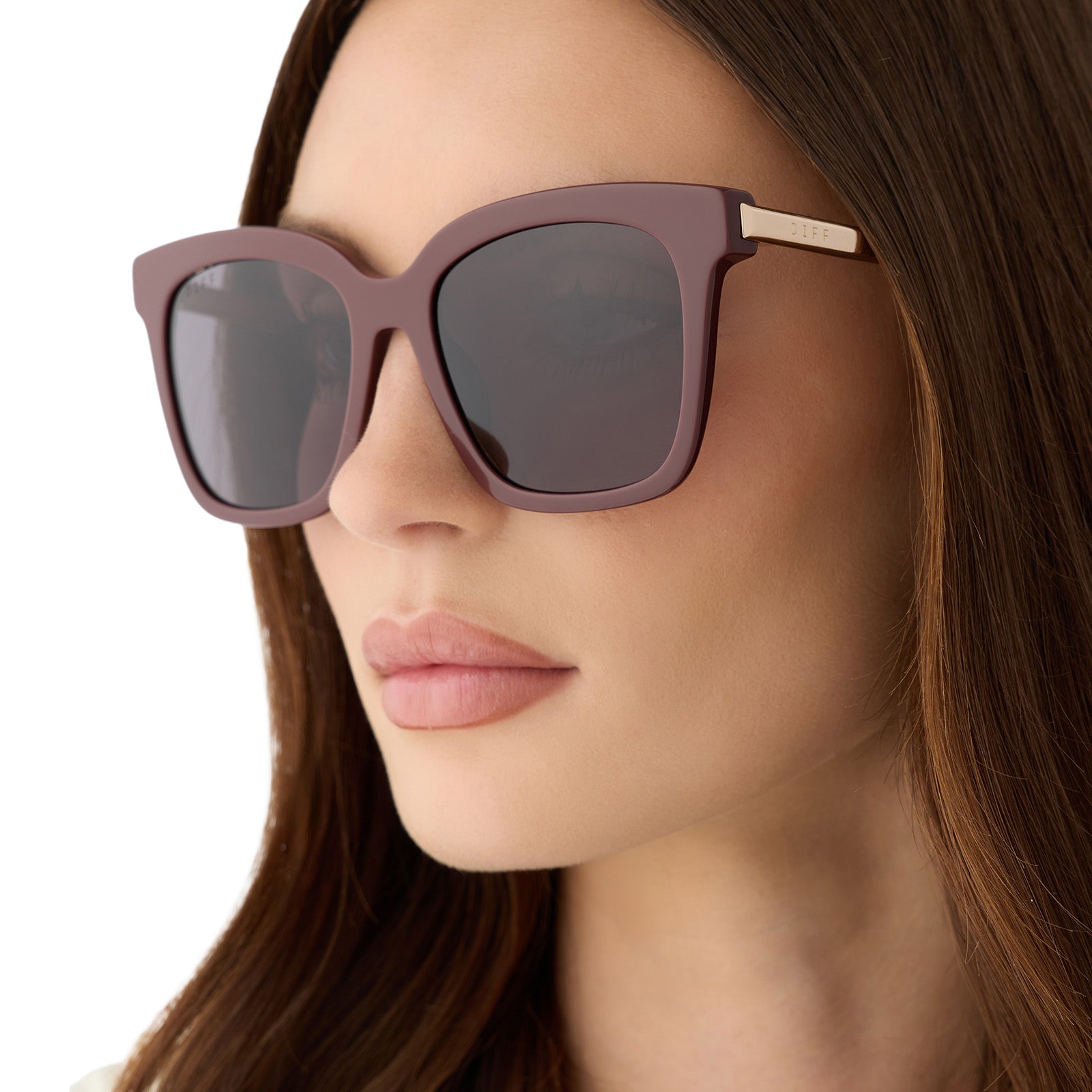 on model - female wearing diff eyewear bella square sunglasses with a rugby red acetate frame and grey polarized lenses detailed view