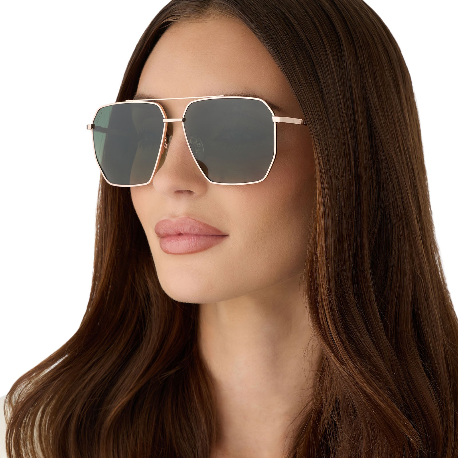 on model - female wearing diff eyewear featuring the berkely navigator sunglasses with a champagne gold (light gold) metal frame and aloe green gradient polarized lenses angled view