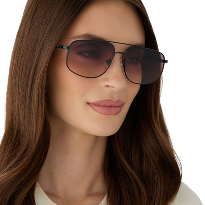 on model - female wearing diff eyewear featuring the charley navigator sunglasses with a shiny black metal frame and twilight gradient lenses angled view