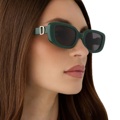 on model - female wearing diff eyewear featuring the daphne rectangle sunglasses with a fairway green acetate frame and grey lenses detailed view