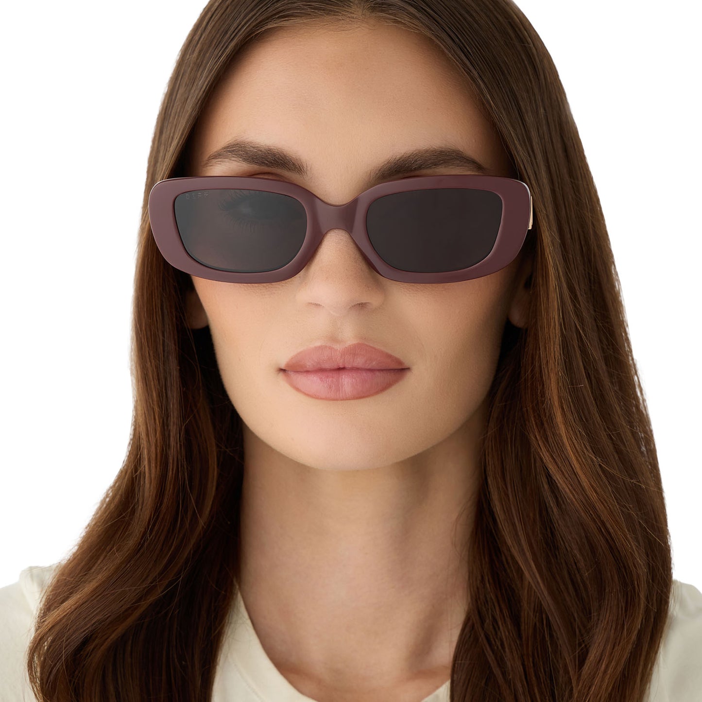 on model - female wearing diff eyewear featuring the daphne rectangle sunglasses with a rugby red acetate frame and grey polarized lenses front view
