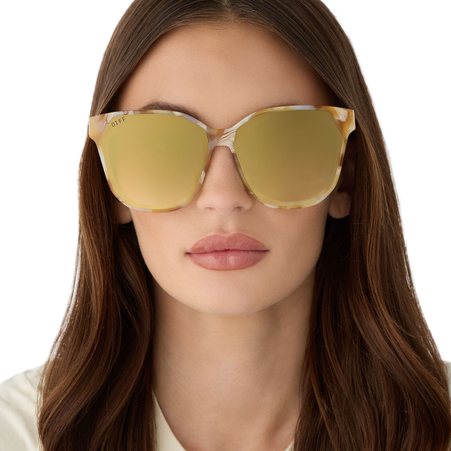 on model - female wearing diff eyewear gia square oversized sunglasses with a gilded tortoise acetate frame and brown gradient with light gold flash lenses front view