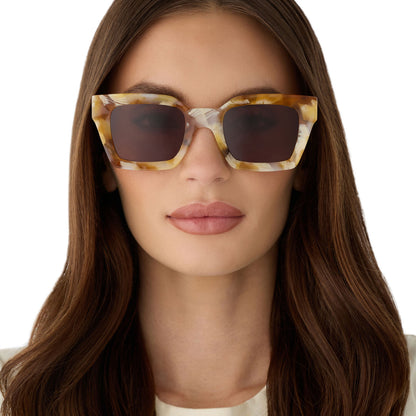 on model - female wearing diff eyewear featuring the greer square sunglasses with a gilded tortoise frame and brown polarized lenses front view