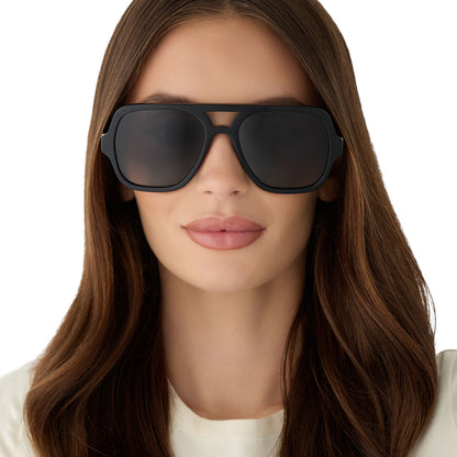 on model - female wearing diff eyewear featuring the layton navigator sunglasses with a black acetate frame and grey gradient polarized lenses front view