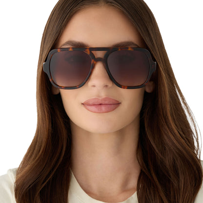 on model - female wearing diff eyewear featuring the layton navigator sunglasses with a rich tortoise acetate frame and brown gradient lenses front view