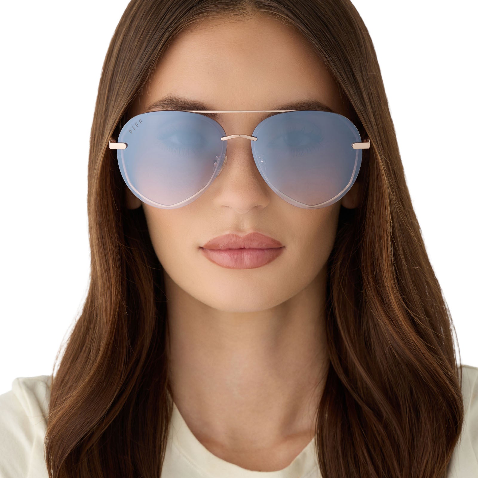 on model - female wearing diff eyewear featuring the lenox aviator sunglasses with a champagne gold (light gold) frame and blue slate gradient flash lenses front view