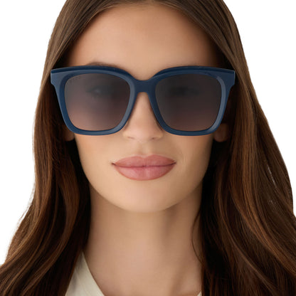 on model - female wearing diff eyewear featuring the meredith square  oversized sunglasses with a clubhouse blue acetate frame and grey gradient polarized lenses front view