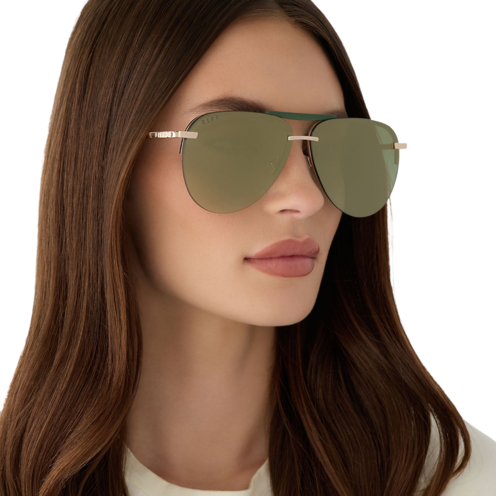 on model - female wearing diff eyewear featuring the tahoe aviator sunglasses with a gold metal and green accent frame with a aloe green gradient and light gold flash polarized sunglasses angled view