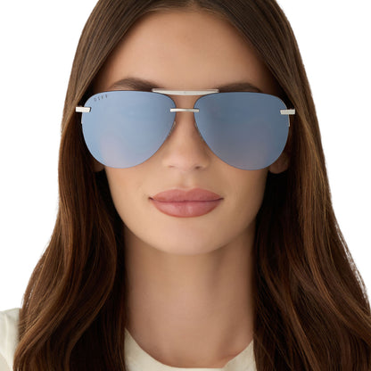 on model - female wearing diff eyewear featuring the tahoe aviator sunglasses with a silver metal frame and slate blue gradient flash polarized lenses front view
