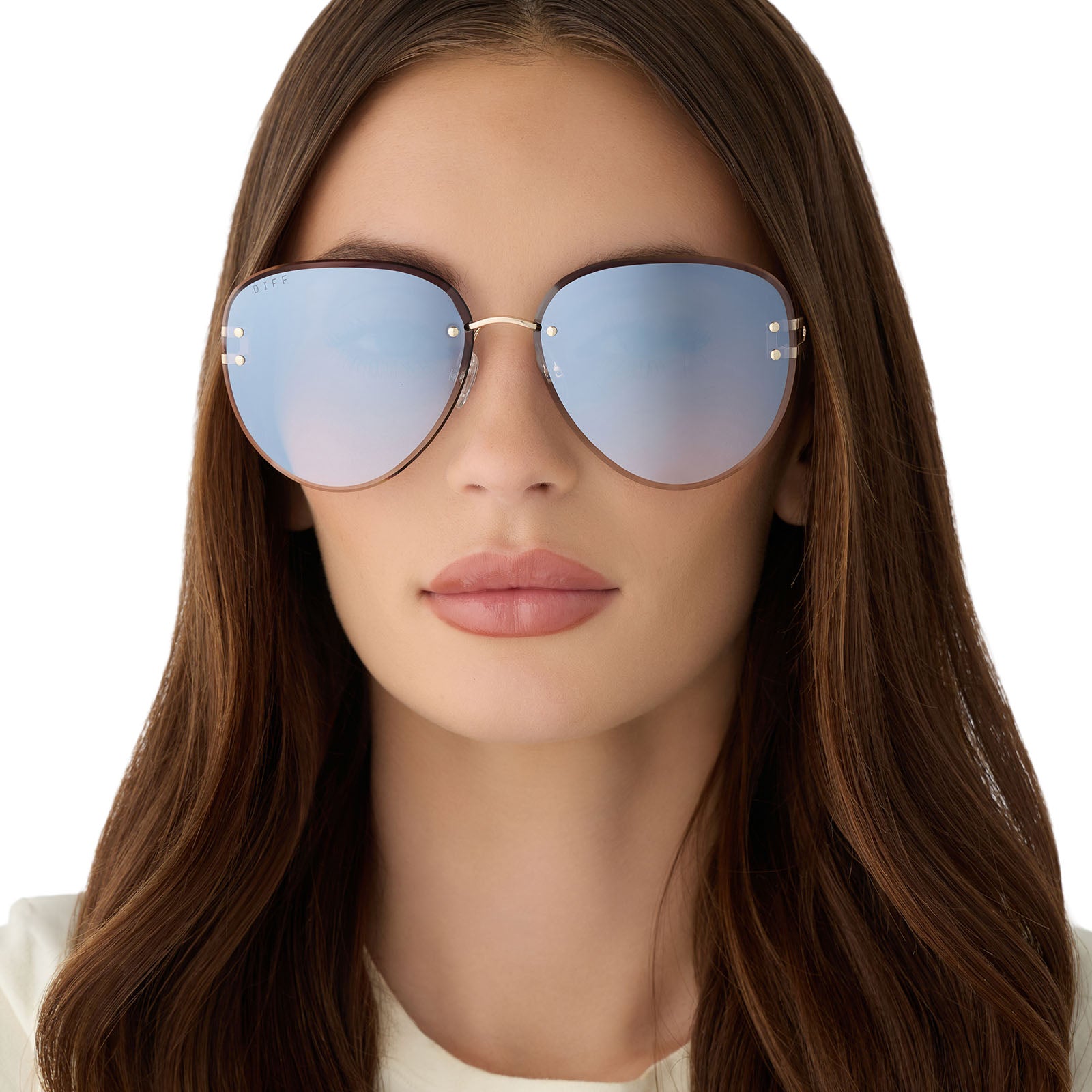 on model - female wearing diff eyewear featuring the trista aviator sunglasses with a gold frame and slate blue gradient flash lenses front view