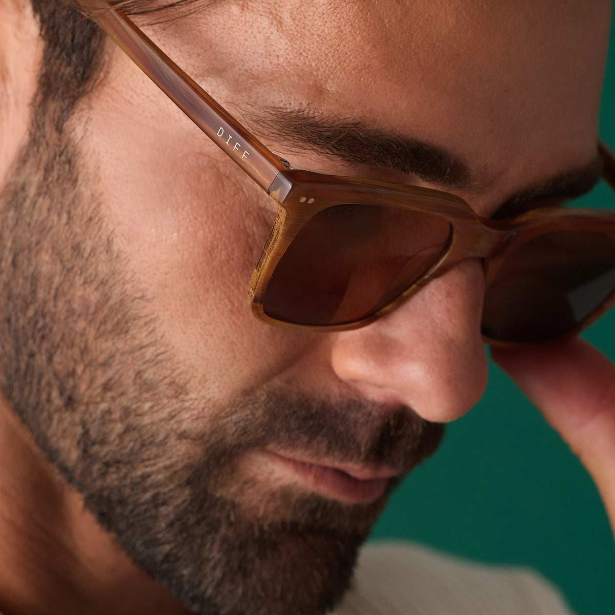 on model - male wearing diff eyewear featuring the billie square sunglasses with a longhorn brown frame and brown polarized lenses detailed view