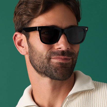 on model - male wearing diff eyewear mercer square sunglasses with a black acetate frame and grey polarized lenses front view