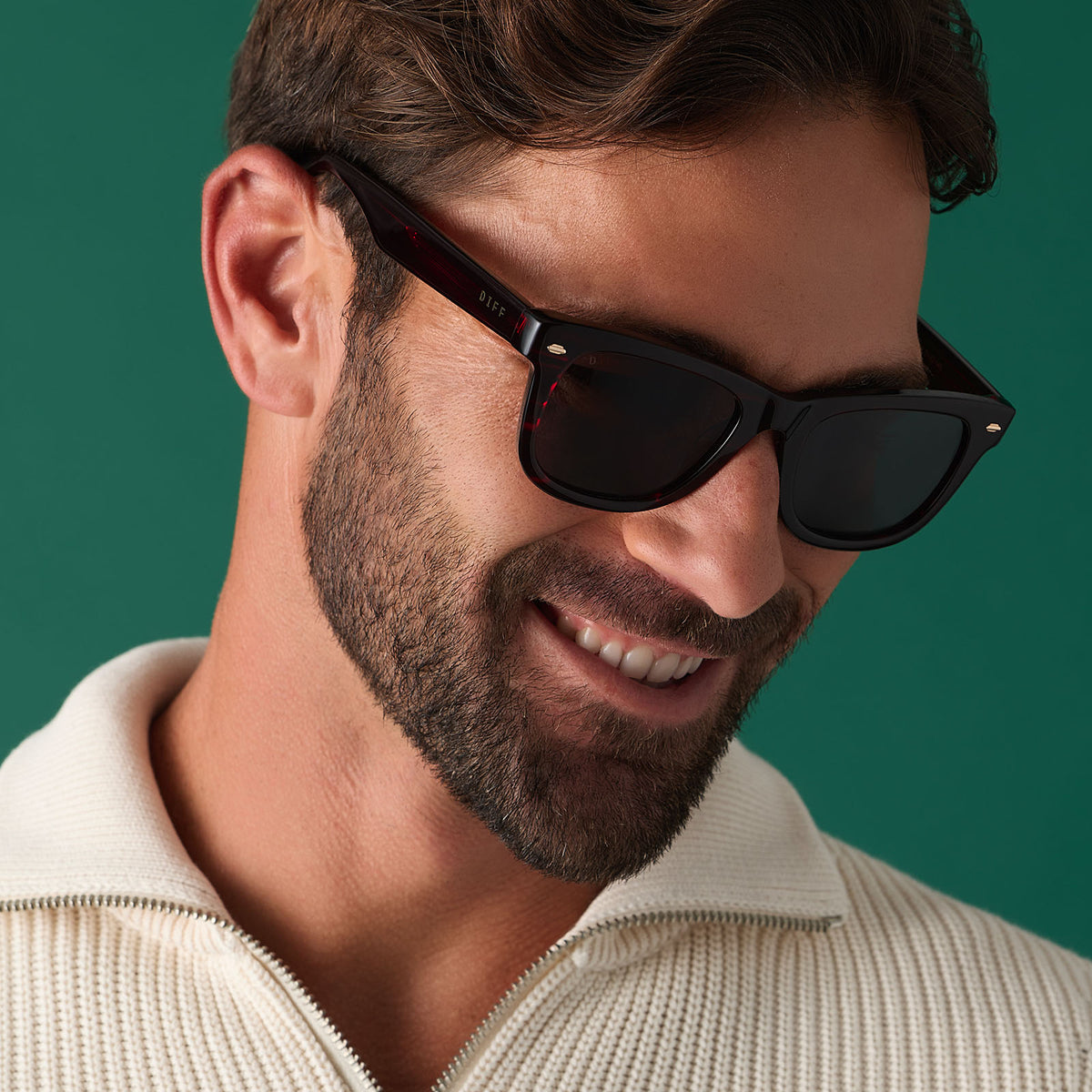 on model - male wearing diff eyewear mercer square sunglasses with a redwood acetate frame and grey polarized lenses angled view