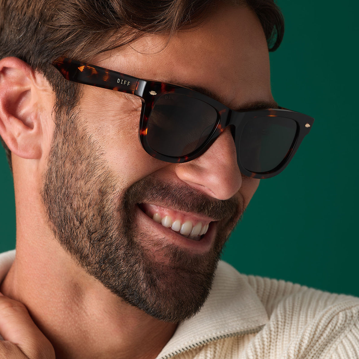 on model - male wearing diff eyewear mercer square sunglasses with a rich tortoise acetate frame and g15 polarized lenses angled view