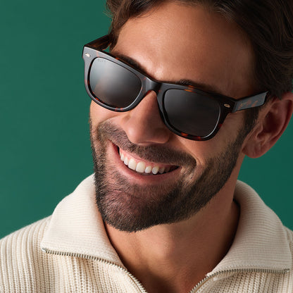 on model - male wearing diff eyewear mercer square sunglasses with a rich tortoise acetate frame and g15 polarized lenses front view