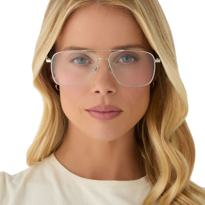on model - female wearing yellowstone x diff eyewear featuring the rip wheeler navigator prescription glasses with a silver frame front view