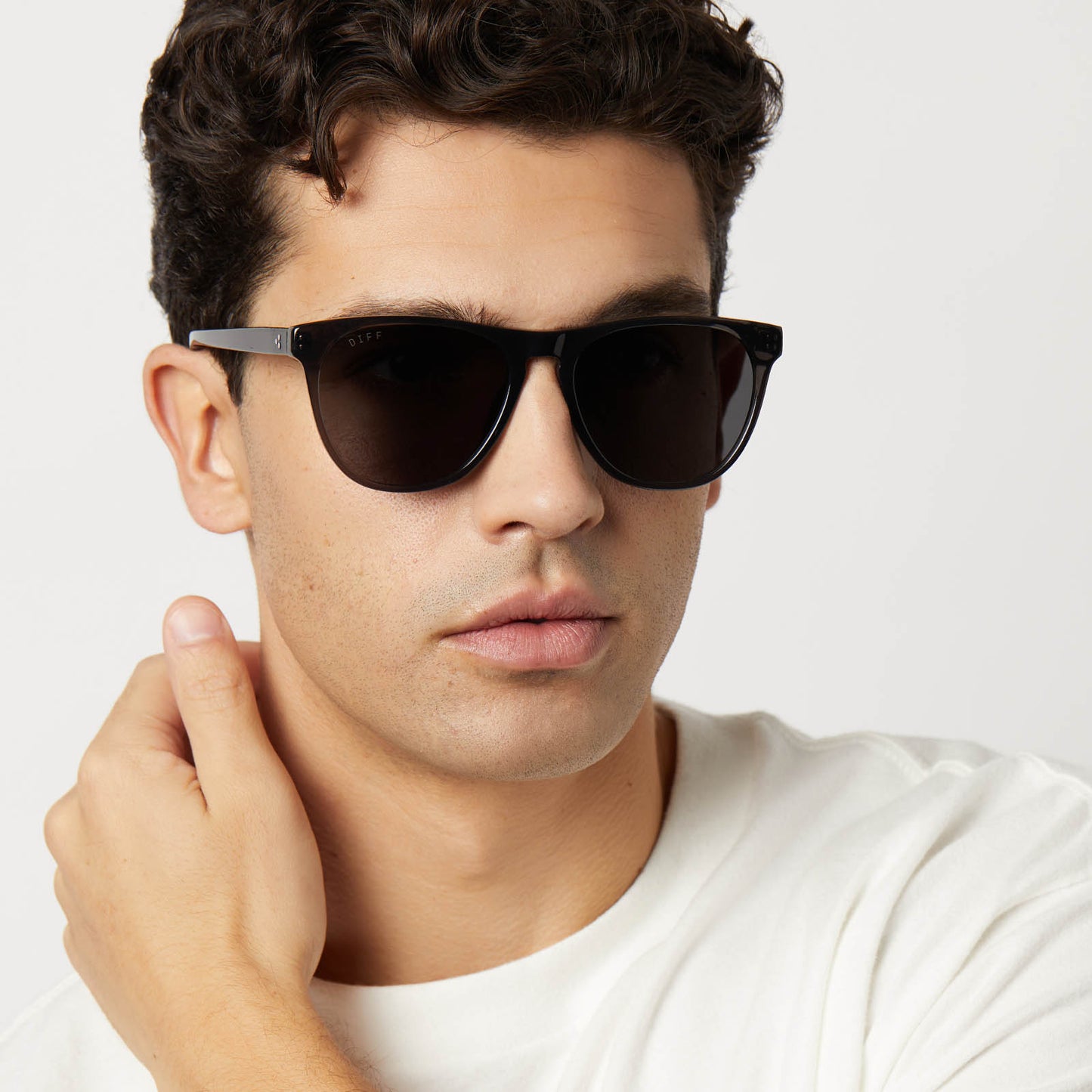 on model - male wearing diff eyewear featuring the darren square sunglasses with a black smoke crystal frame and grey polarized lenses front view