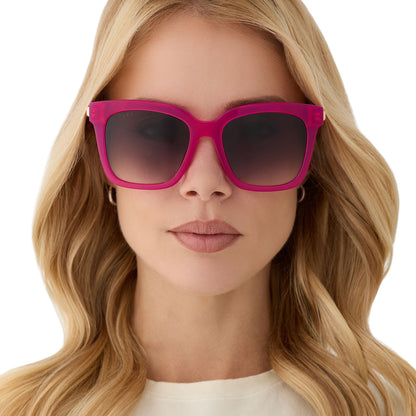 on model - female wearing diff eyewear featuring the bella square sunglasses with a bright tulip with gold frame and grey gradient lenses front view