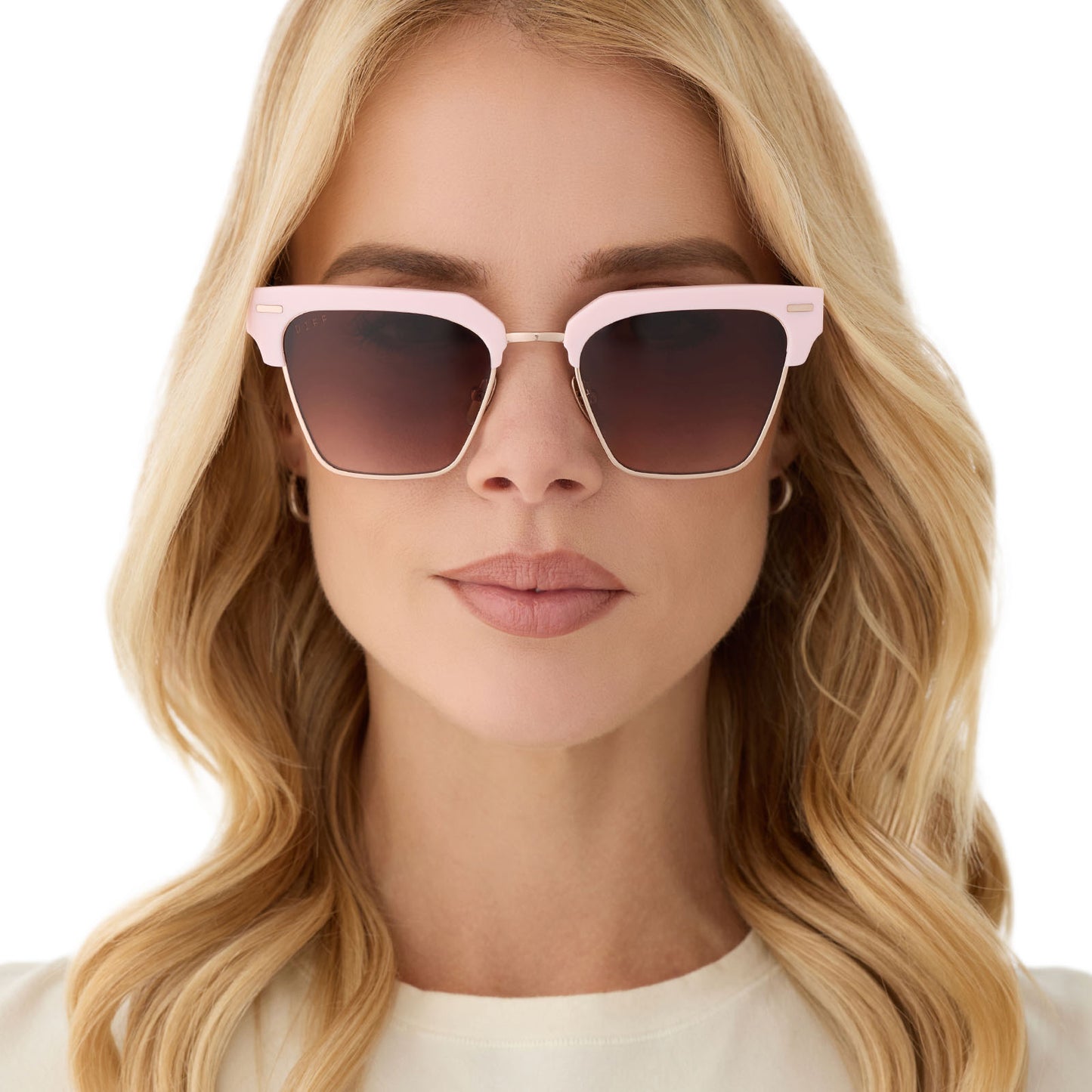 on model - female wearing diff eyewear featuring the capri rectangle sunglasses with a powder pink with champagne frame and brown gradient lenses front view