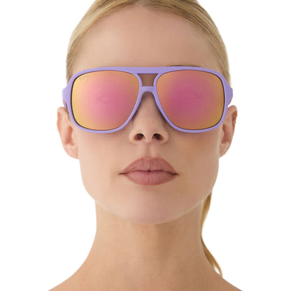 on model - female wearing diff sport featuring the hangtime aviator sunglasses with a matte lavender frame and sherbet mirror polarized lenses front view