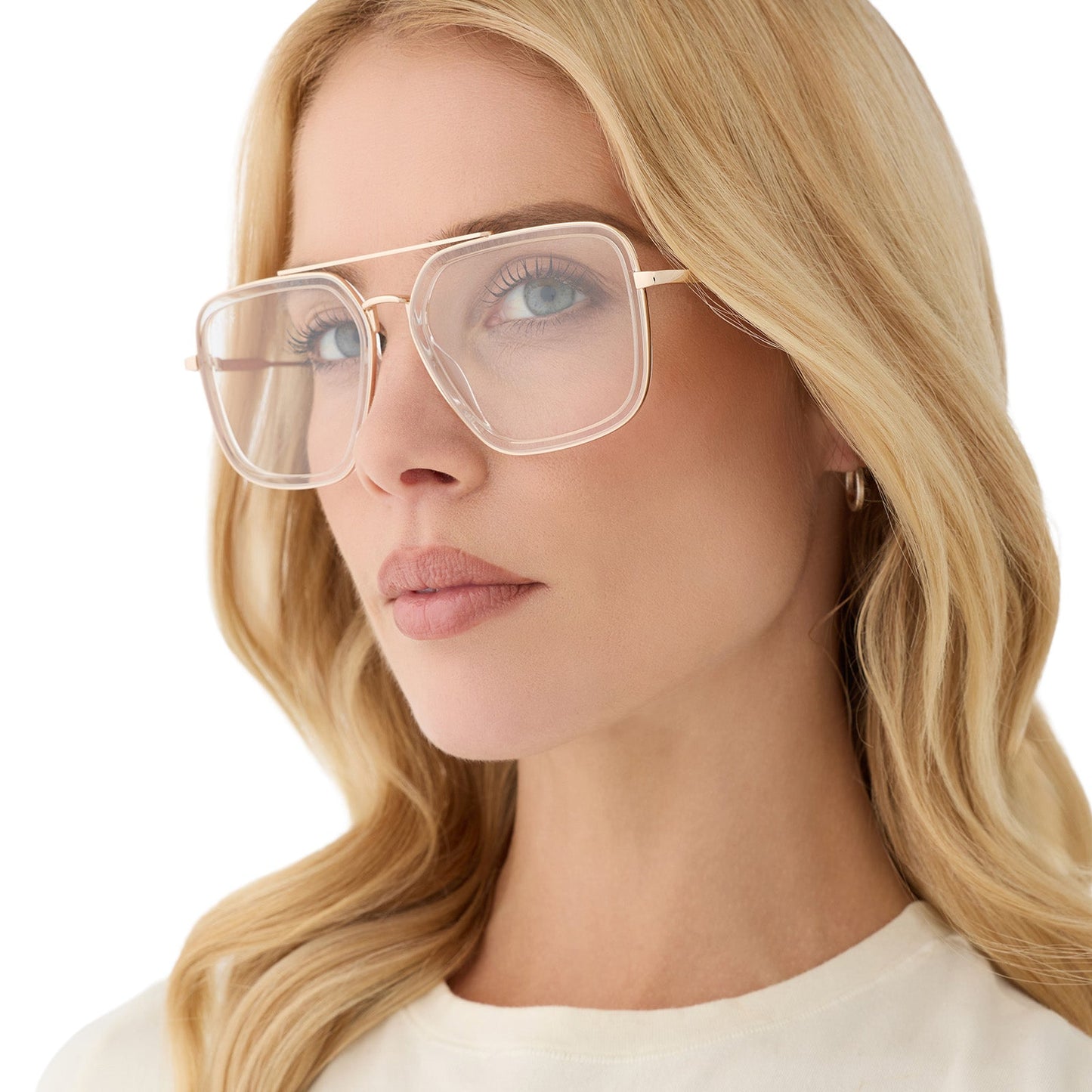 on model - female wearing diff eyewear featuring the jordan navigator prescription glasses with a gold frame, clear crystal temple tips angled view