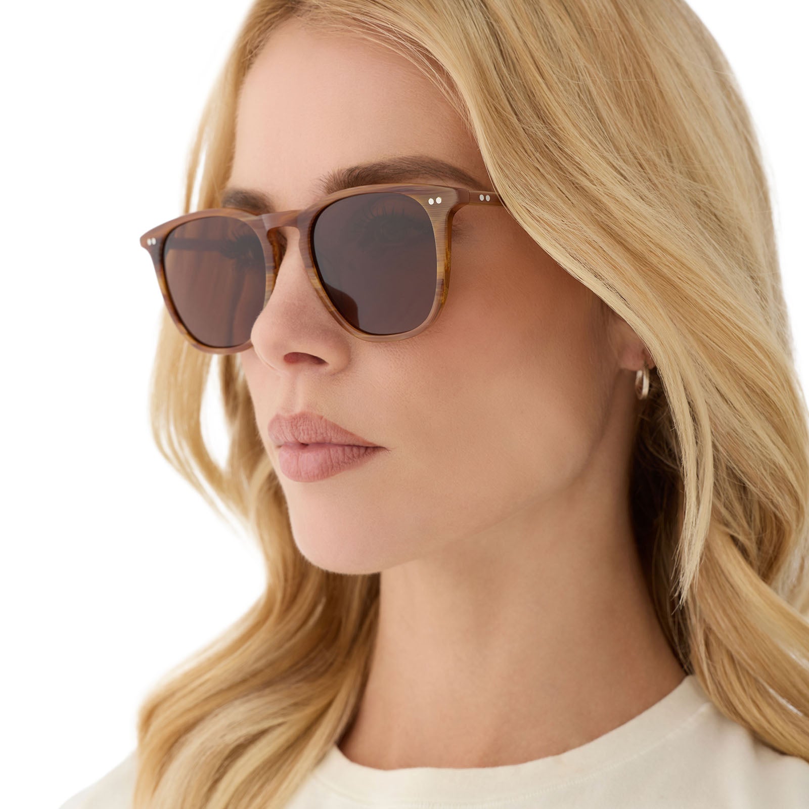 on model - female wearing diff eyewear featuring the maxwell xl square sunglasses with a longhorn brown frame and brown polarized lenses angled view