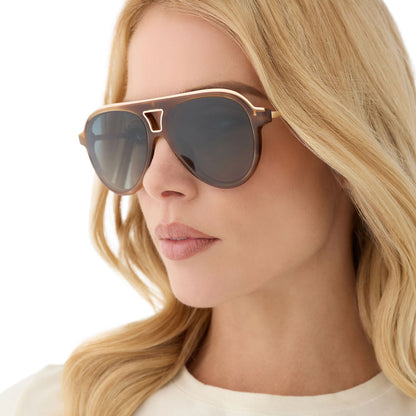 on model - female wearing diff eyewear featuring the tosca iii aviator sunglasses with a tawny brown tortoise frame and brown gradient polarized lenses angled view