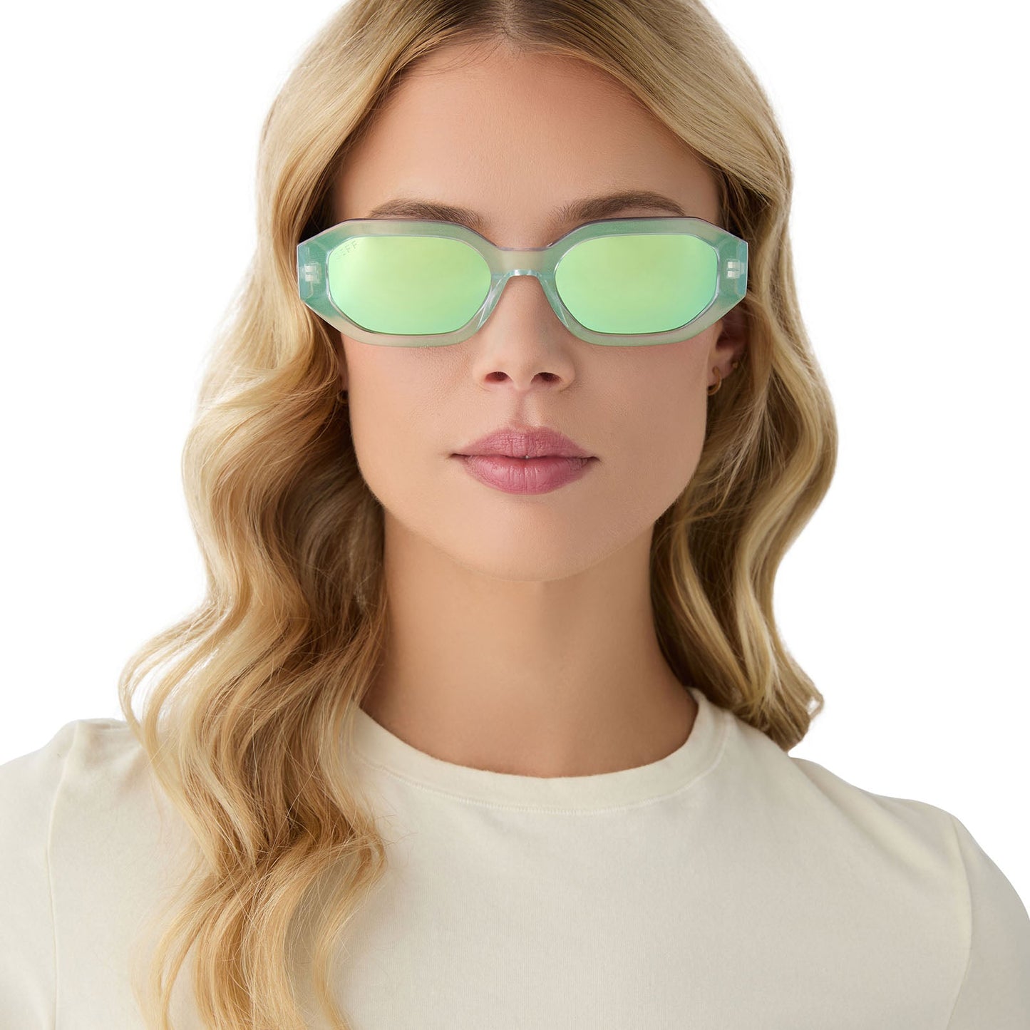 on model - blonde female wearing diff eyewear allegra square sunglasses with a opalescent turquoise acetate frame and turquoise ice mirror lenses front view