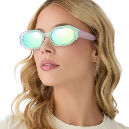 on model - blonde female wearing diff eyewear allegra square sunglasses with a opalescent turquoise acetate frame and turquoise ice mirror lenses angled view