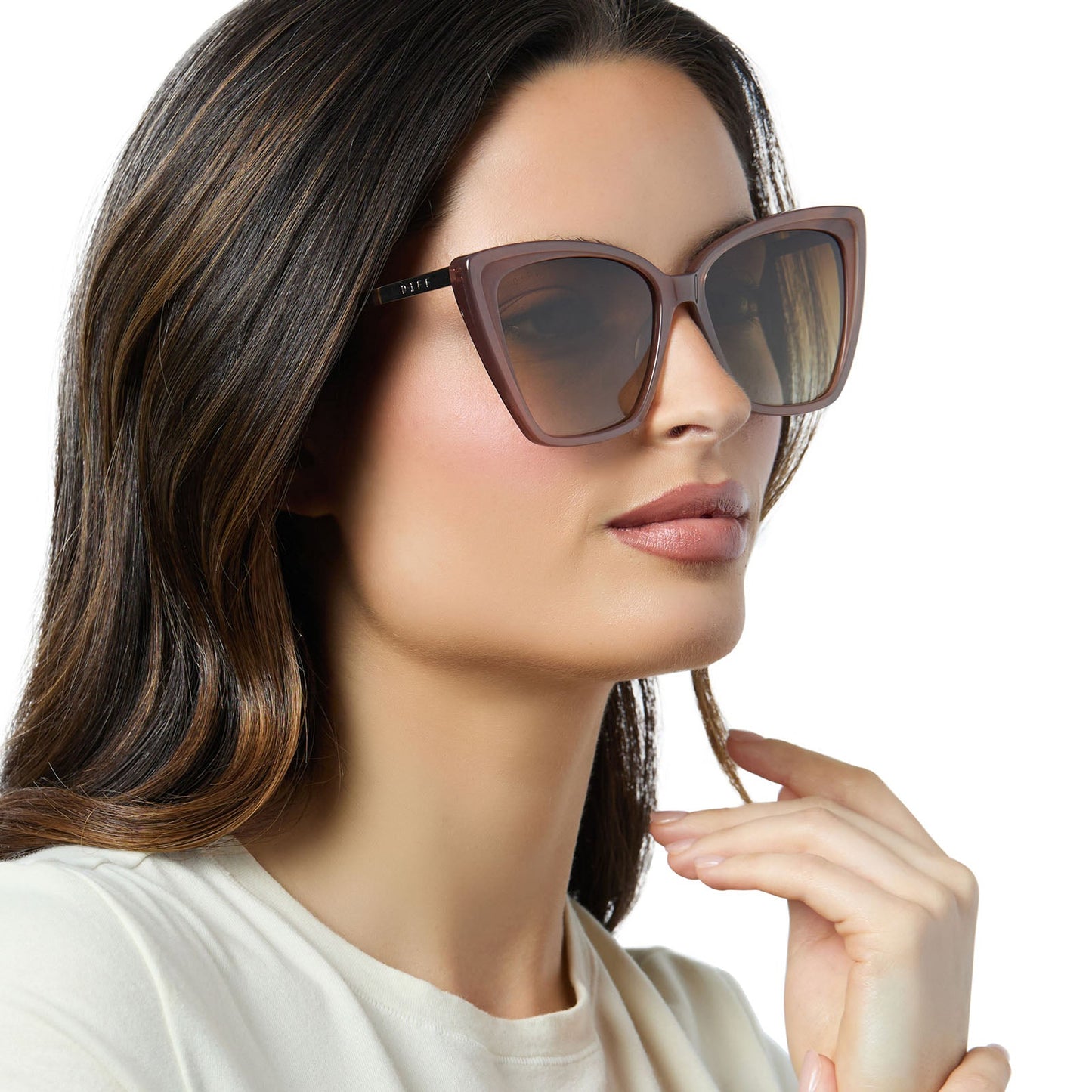 on model - female wearing diff eyewear becky ii oversized cat eye sunglasses with a macchiato brown frame and brown gradient polarized lenses angled view