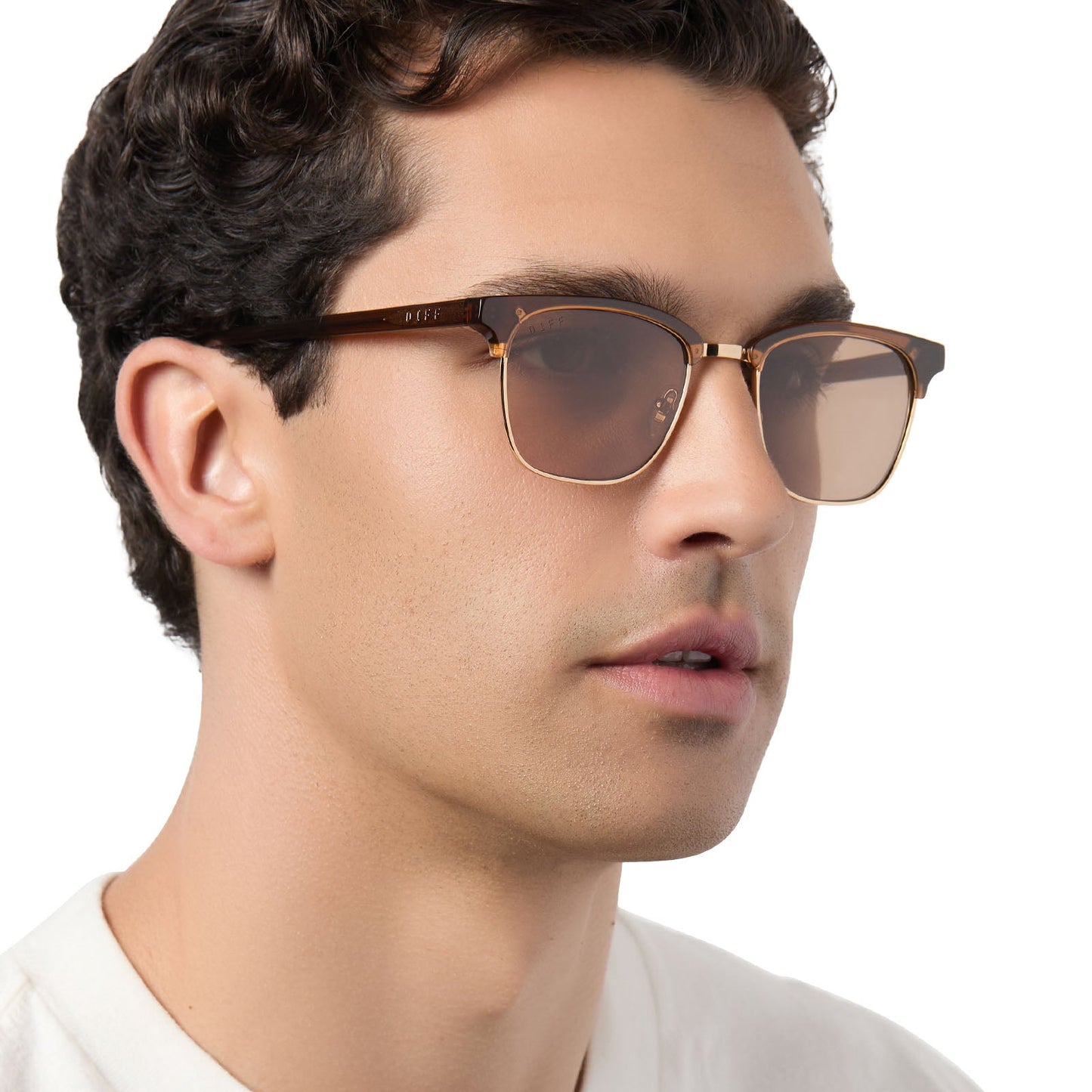 on model - male wearing diff eyewear biarritz square sunglasses with a whiskey/gold frame and brown polarized lenses angled view