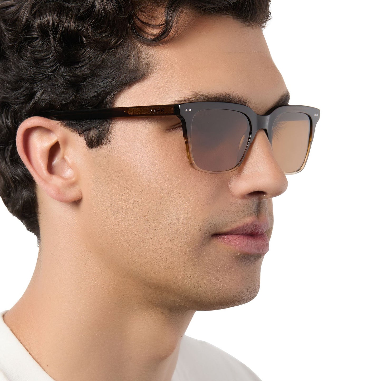 on model - male wearing diff eyewear billie square sunglasses with a mocha brown gradient frame and brown polarized lenses angled view