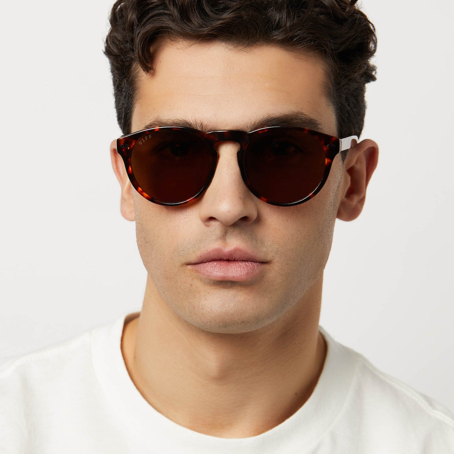 on model - male wearing diff eyewear featuring the cody xl round sunglasses with a rich tortoise frame and brown polarized lenses front view