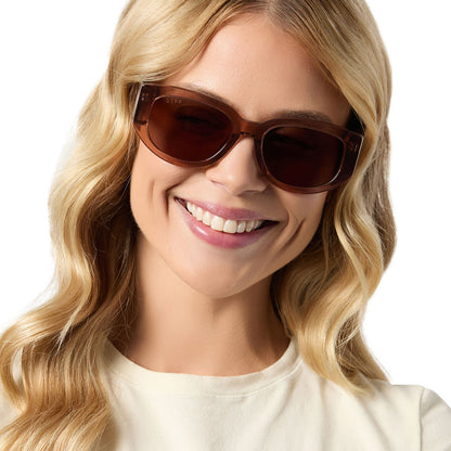 on model - female wearing diff eyewear drew square sunglasses with a cafe ole brown acetate frame and brown lenses front view