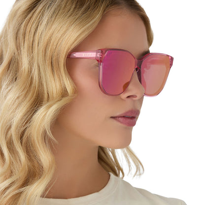 on model - female wearing diff eyewear gia oversized square sunglasses with a candy pink crystal acetate frame and pink rush mirror lenses side view