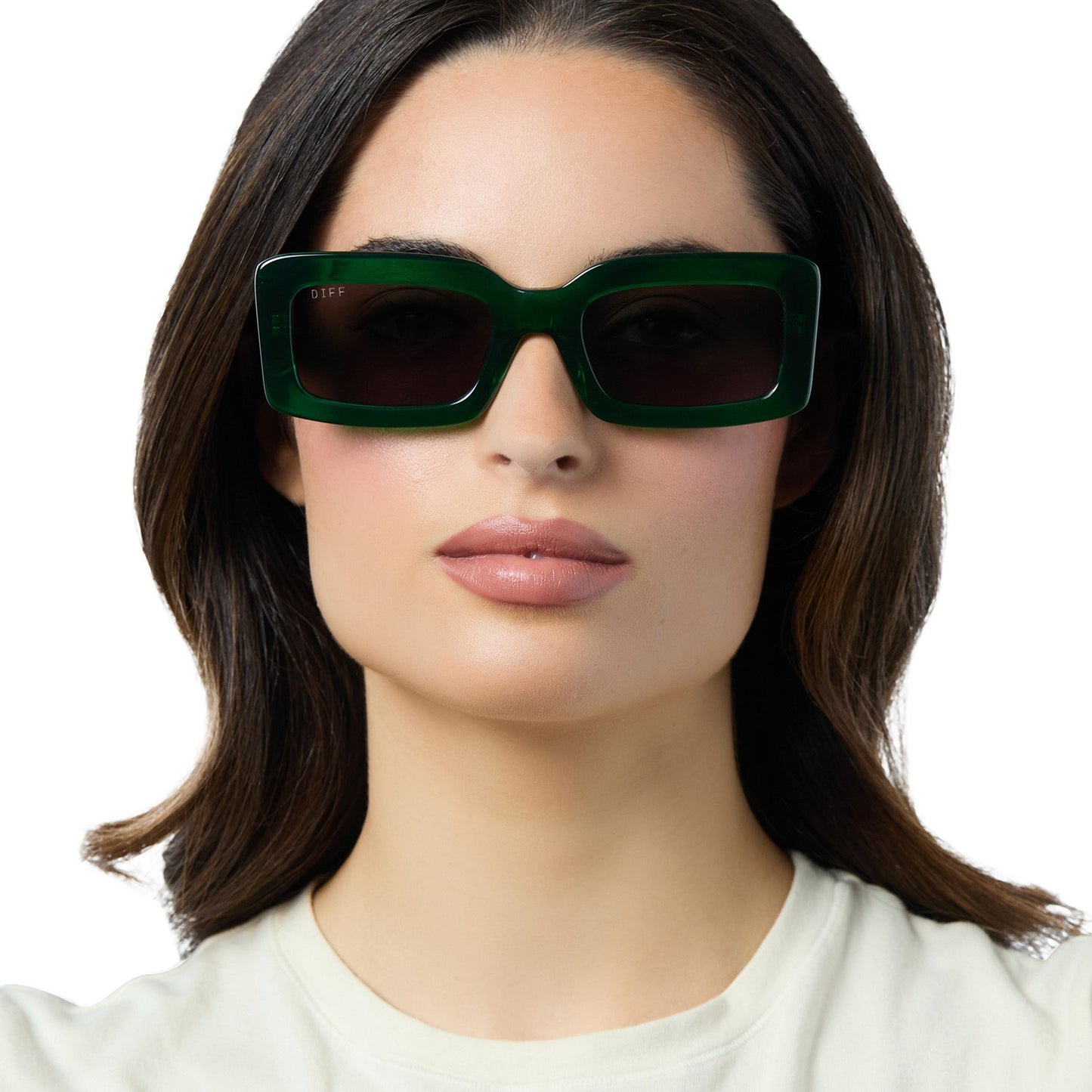 on model - female wearing diff eyewear indy square sunglasses with a palm green crystal frame and grey polarized lenses front view