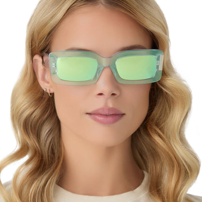 on model - female wearing diff eyewear indy square sunglasses with a opalescent turquoise frame and turquoise ice lenses front view