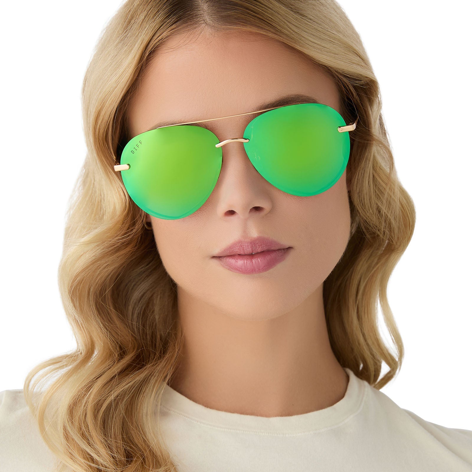 on model - female wearing diff eyewear lenox aviator sunglasses with a gold metal frame, green temple tips and  green mirror polarized lenses front view