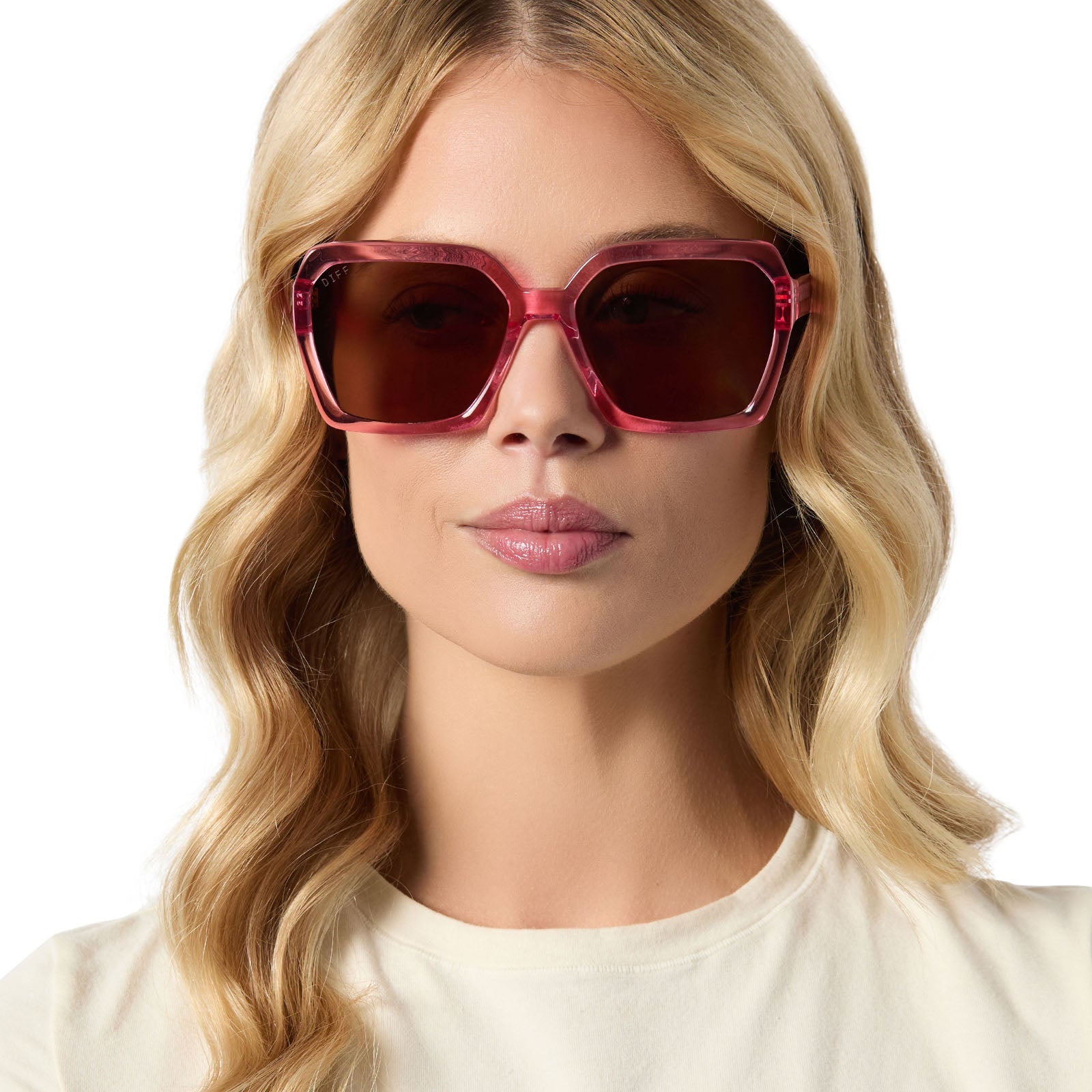 on model - female wearing diff eyewear sloane square oversized sunglasses with a candy pink crystal acetate frame and brown lenses front view