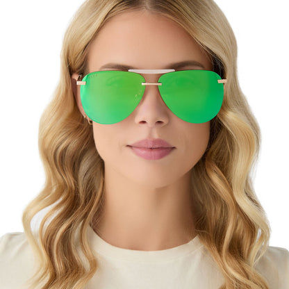 on model - female wearing diff eyewear tahoe aviator oversized sunglasses with a gold metal frame and brilliant green mirror lenses front view