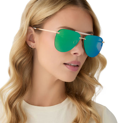 on model - female wearing diff eyewear tahoe aviator oversized sunglasses with a gold metal frame and brilliant green mirror lenses angled view