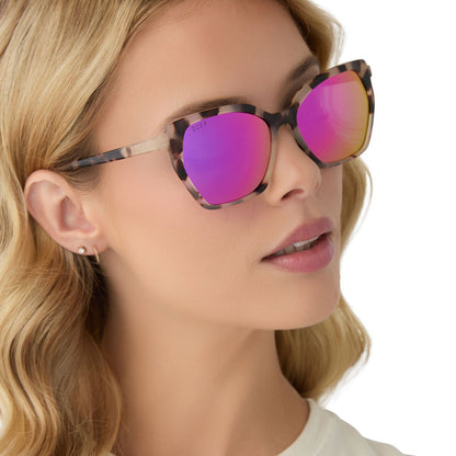 on model - female wearing diff eyewear vera square oversized sunglasses with a cream tortoise acetate frame and pink rush mirror lenses angled view