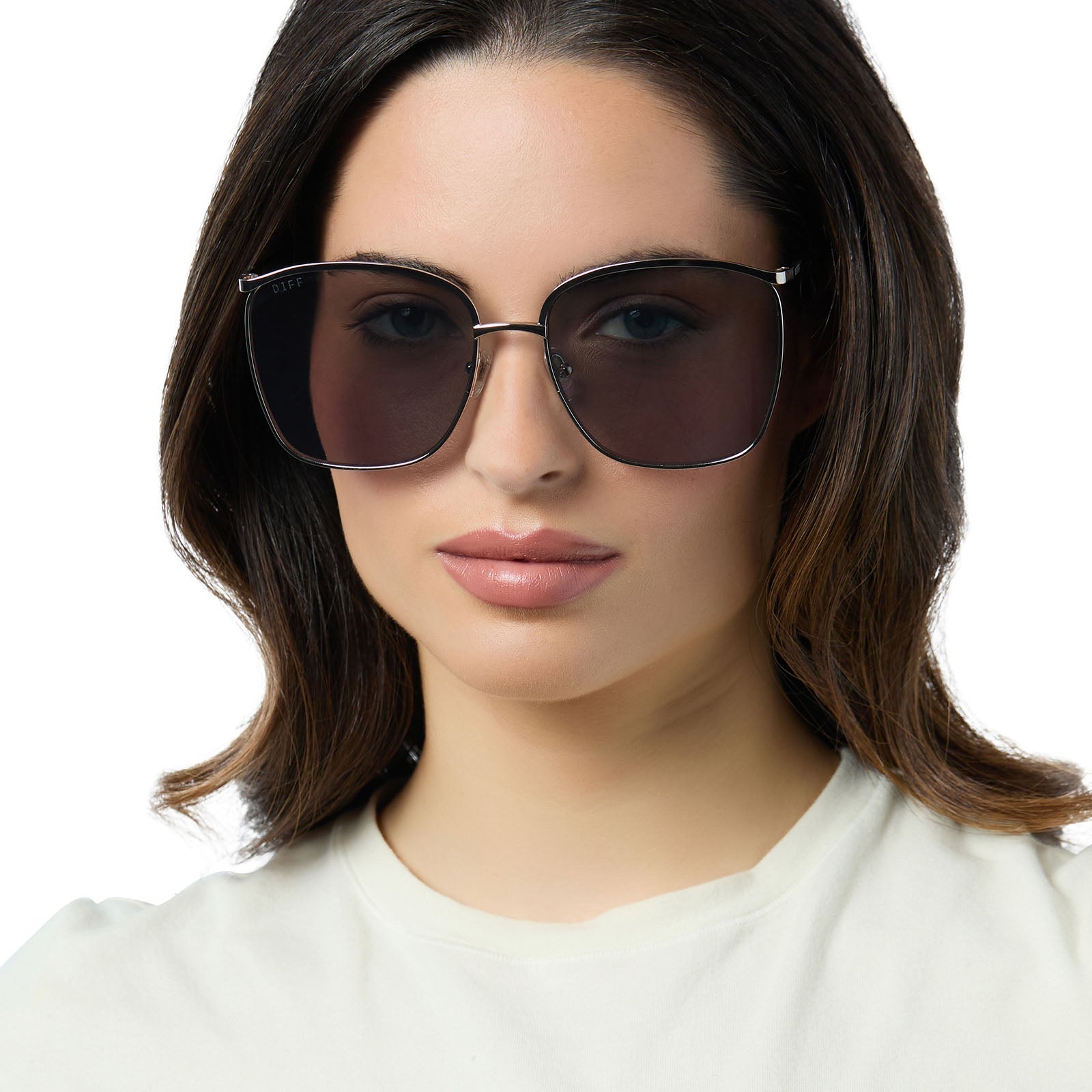 on model - female wearing diff eyewear vittoria square oversized sunglasses with a silver metal frame and silver mirror lenses front view