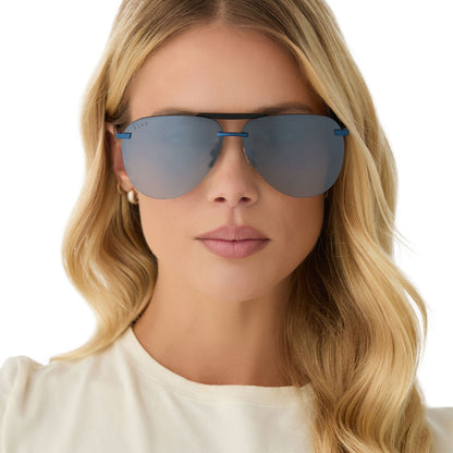 on model - female wearing diff eyewear featuring the tahoe aviator sunglasses with a deep navy metal frame and aegean blue flash polarized lenses front view